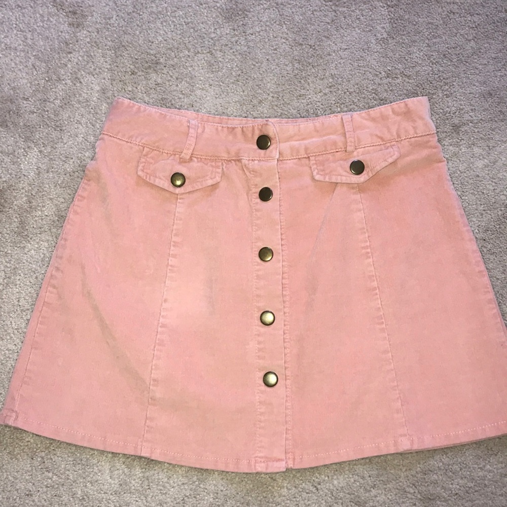 Salmon pink denim skirt.